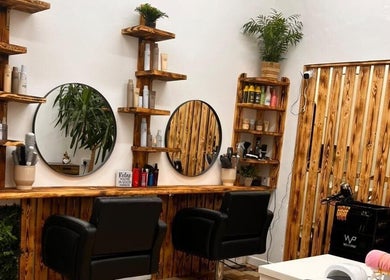 Elegant salon chairs and decor at Sanela haircraft, Drogheda, County Louth, IE for a premium beauty experience.