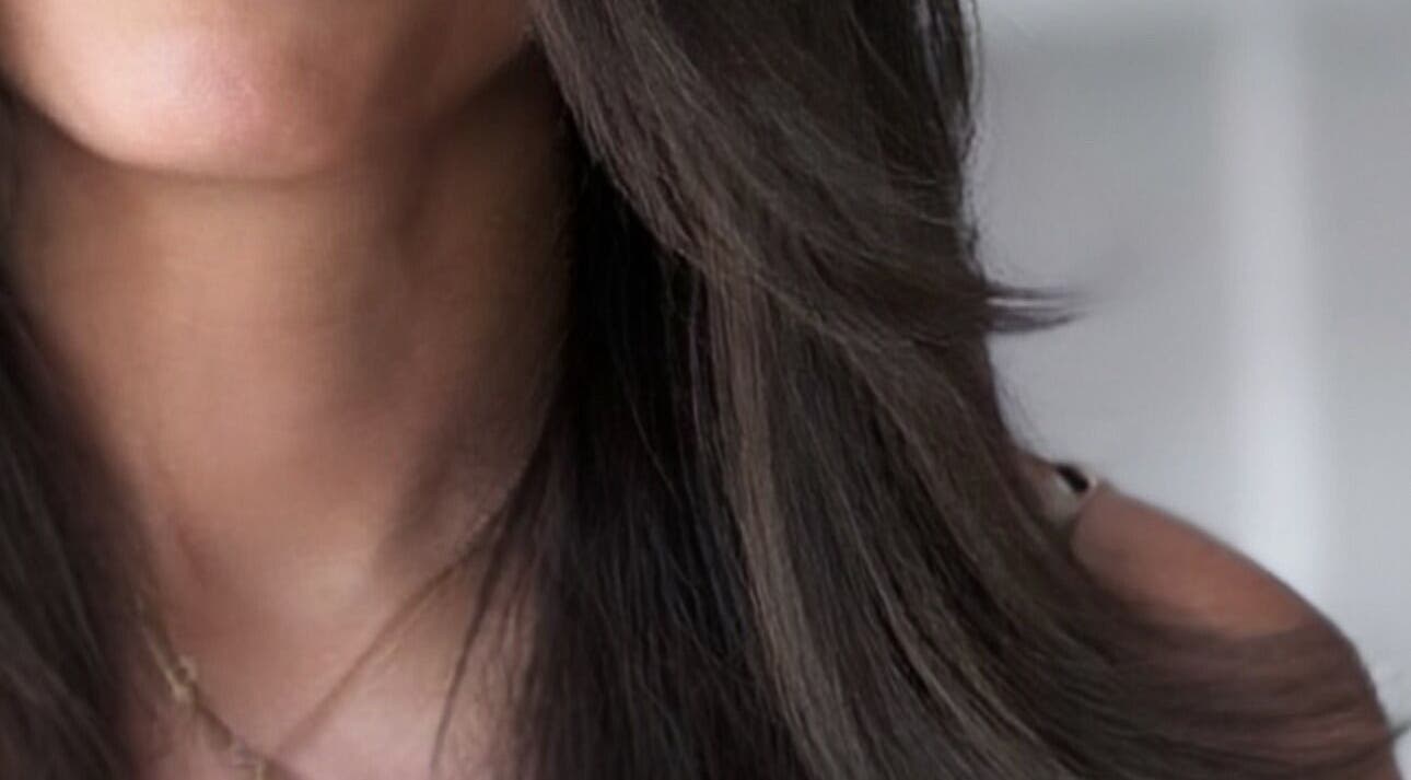 Smooth, sleek hair styled by Sabrina Saeed Hairdesigner in Shelfords, England, GB.