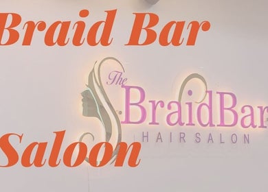 The BraidBar Hair Salon Ng signage in vibrant colors at Lagos, Lagos, NG. A welcoming salon entrance.