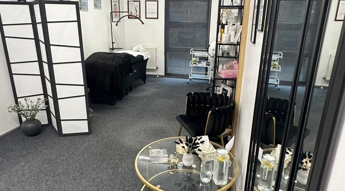 Elegant interior of Ambers Beauty Studio, Hayle, England, GB, featuring a cozy treatment area and modern decor.