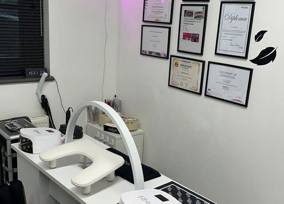 Nail station and certificates at Ambers Beauty Studio, Hayle, England, GB showcasing professionalism.