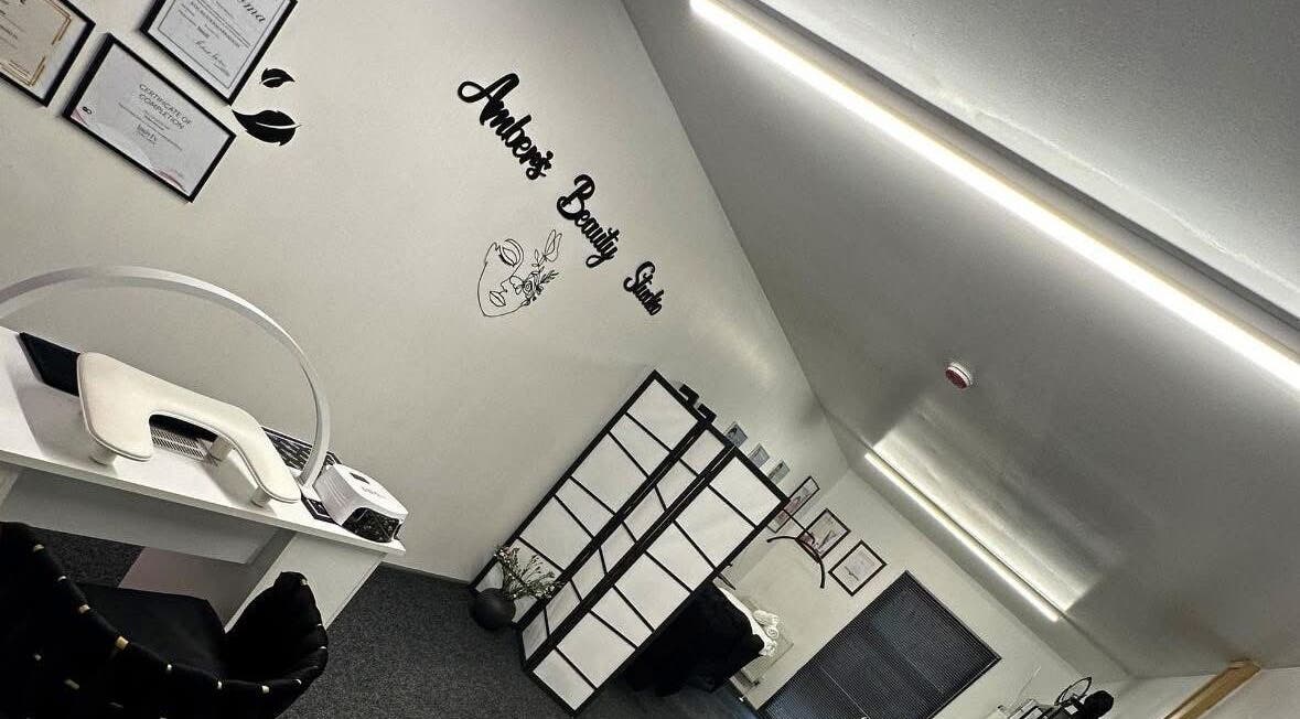 Interior view of Ambers Beauty Studio in Hayle, England, showcasing elegant decor and a serene atmosphere.