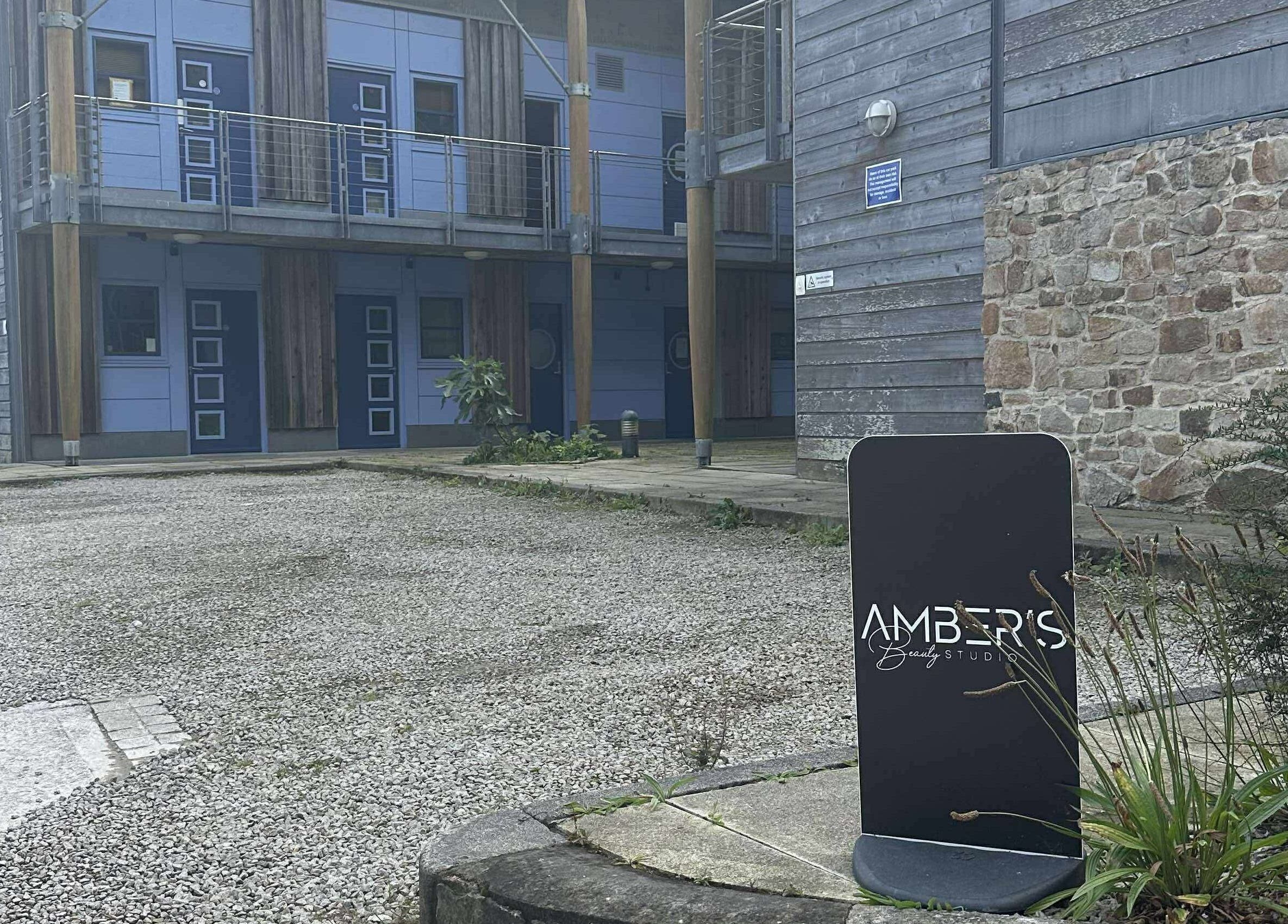 Exterior of Amber's Beauty Studio in Hayle, England, GB, showcasing modern design with a welcoming sign.