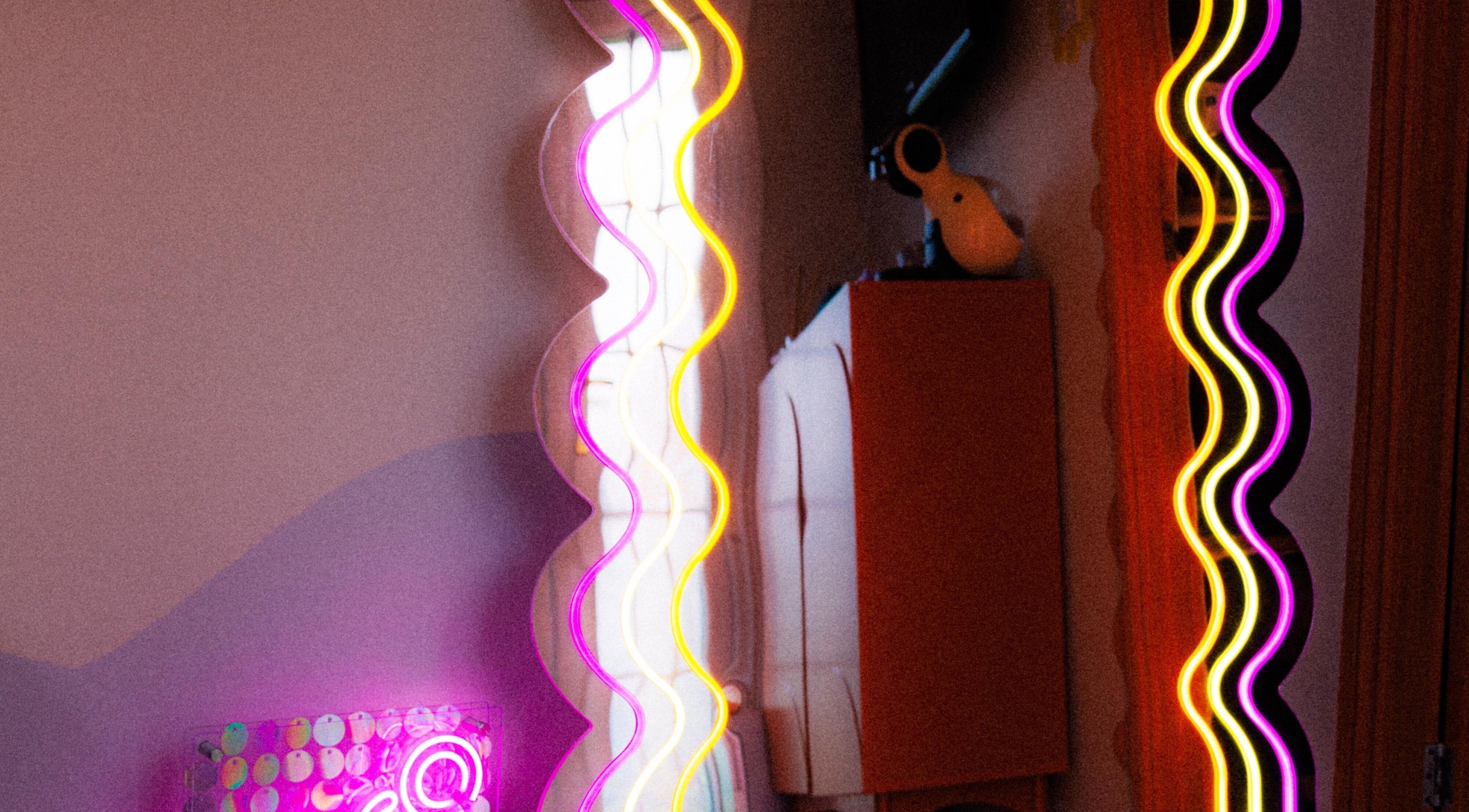 Vibrant neon lights at Bobby Dazzler Nails in Winlaton, England, GB, creating a lively and colorful ambiance.