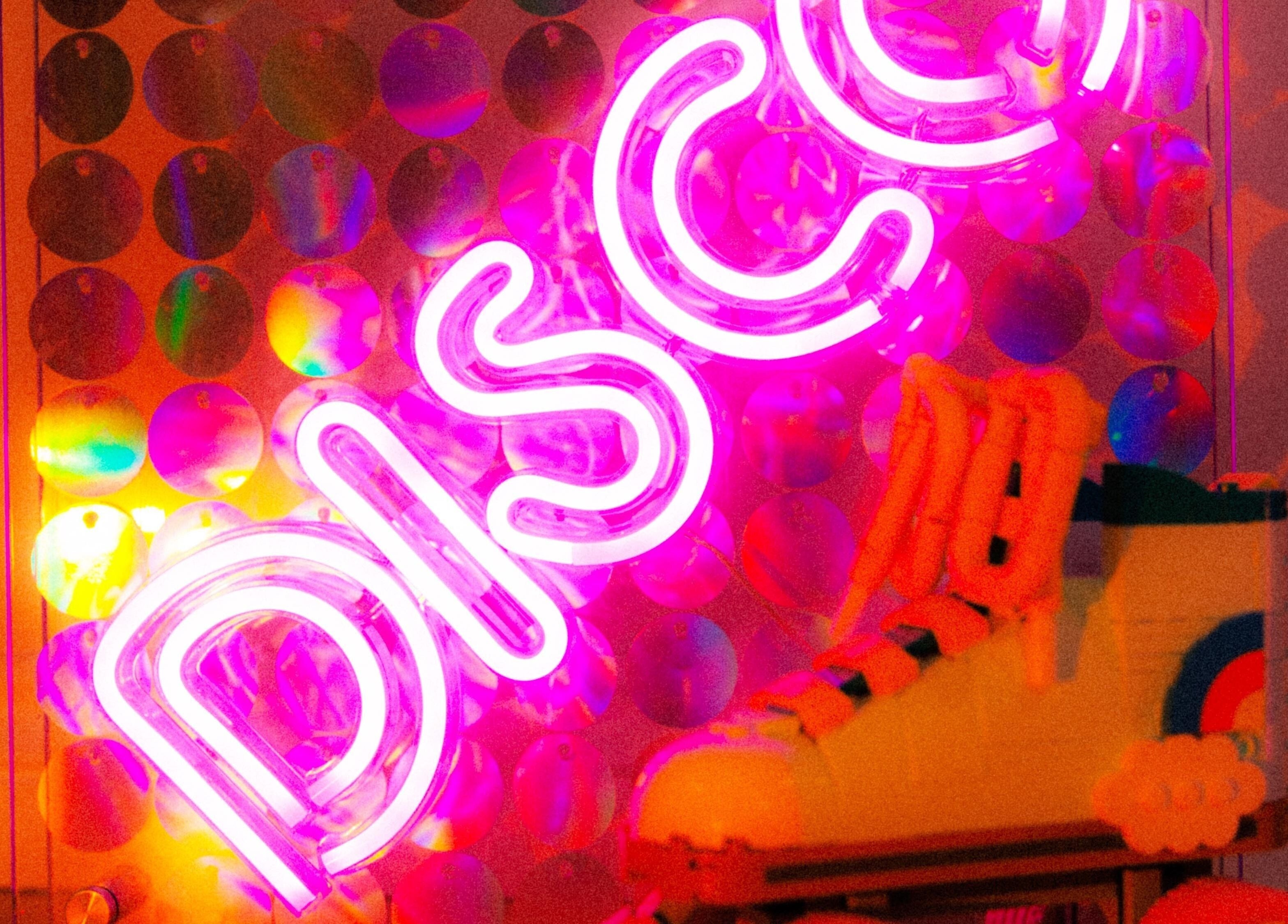 Neon disco lights with roller skate at Bobby Dazzler Nails, Winlaton, England, GB.