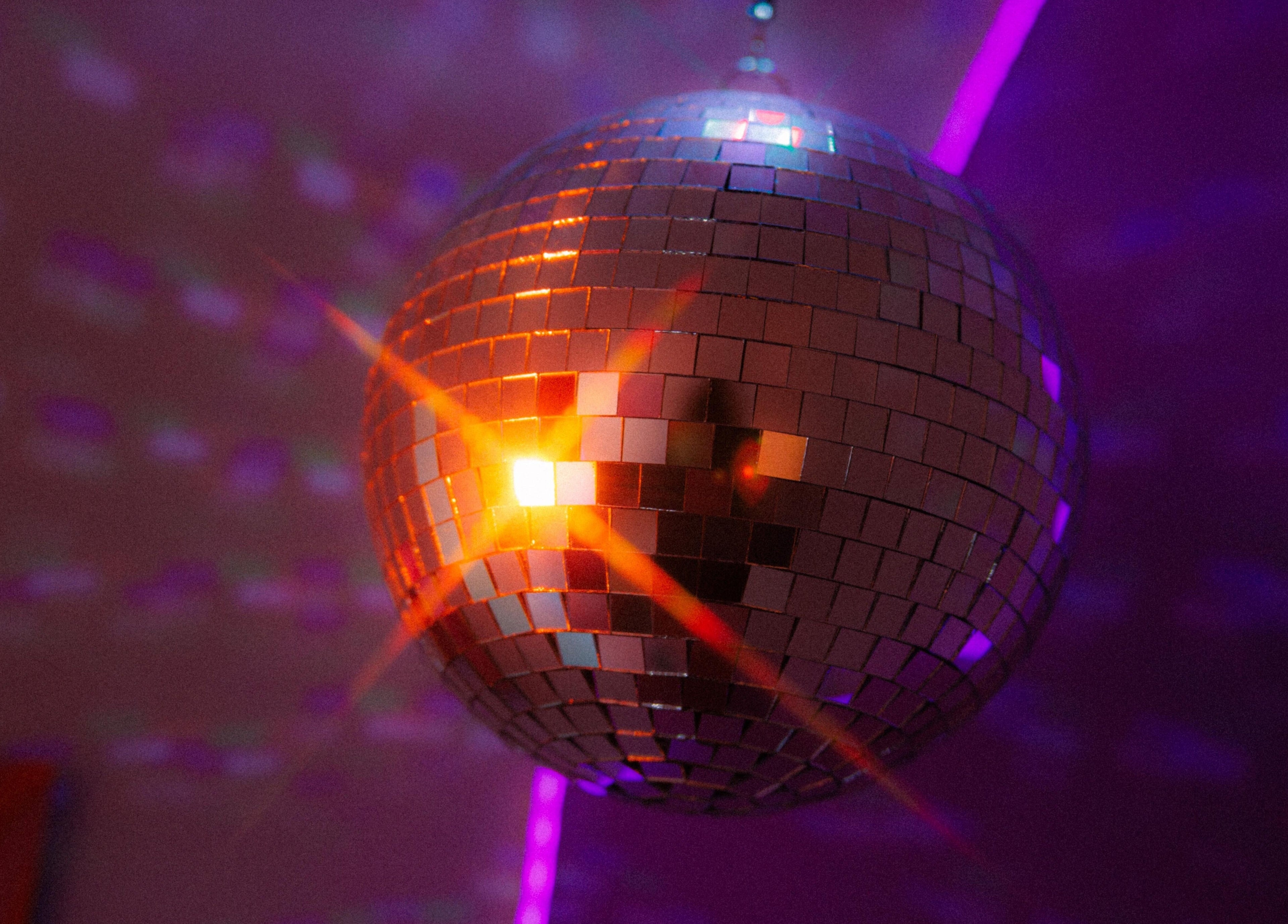 Glistening disco ball at Bobby Dazzler Nails, Winlaton, England, GB enhancing a vibrant ambiance.