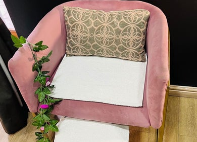Elegant pink chair with floral decor at Trends beauty bar, Cape Town, Western Cape, ZA.