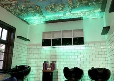 Washtub area with artistic ceiling at Lou Aldwick hair, Bognor Regis, England, GB.