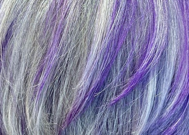 Vibrant purple and silver hair at Lou Aldwick hair in Bognor Regis, England, GB.