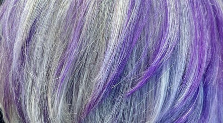 Vibrant purple and silver hair at Lou Aldwick hair in Bognor Regis, England, GB.