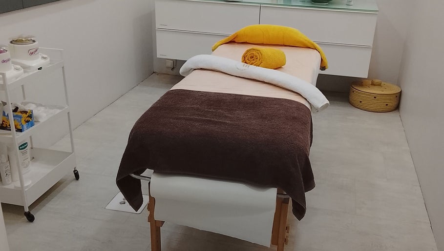 A tranquil massage table in Beauty By Bev, Maputo, Maputo, MZ, ready for a relaxing spa experience.