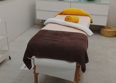 A tranquil massage table in Beauty By Bev, Maputo, Maputo, MZ, ready for a relaxing spa experience.