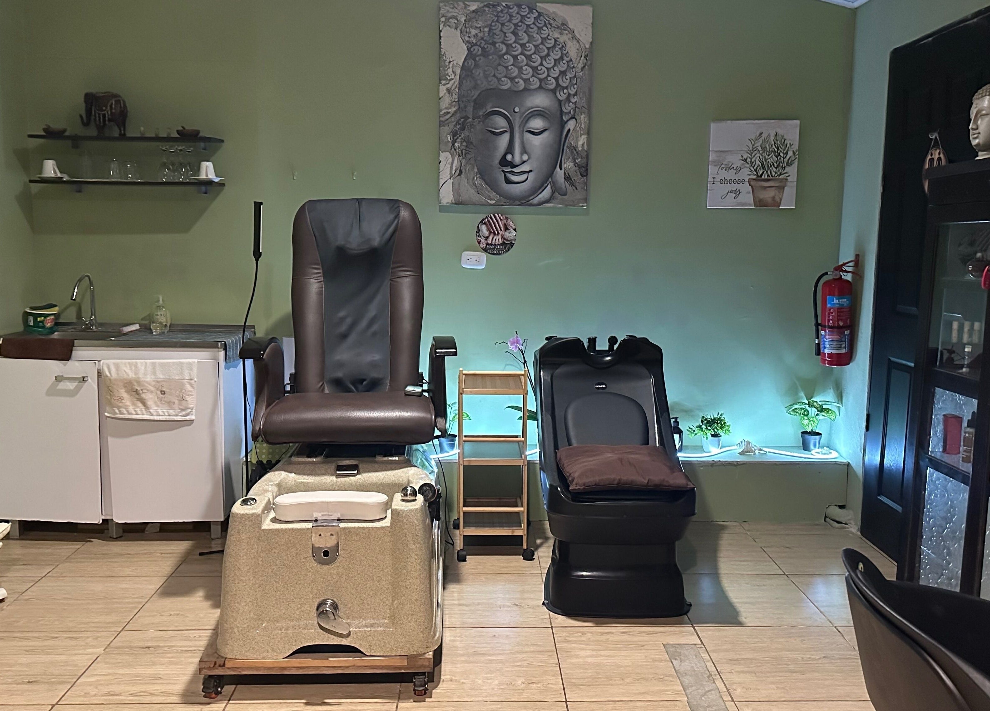 Serene spa setting at Sunset Body Works, Uvita, Provincia De Puntarenas, CR with massage chairs and calming decor.