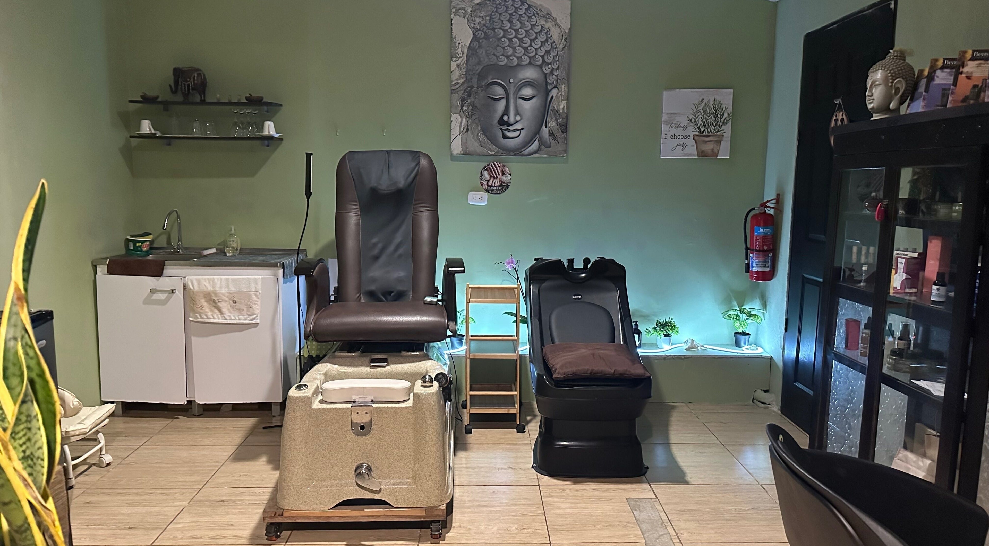 Serene spa setting at Sunset Body Works, Uvita, Provincia De Puntarenas, CR with massage chairs and calming decor.