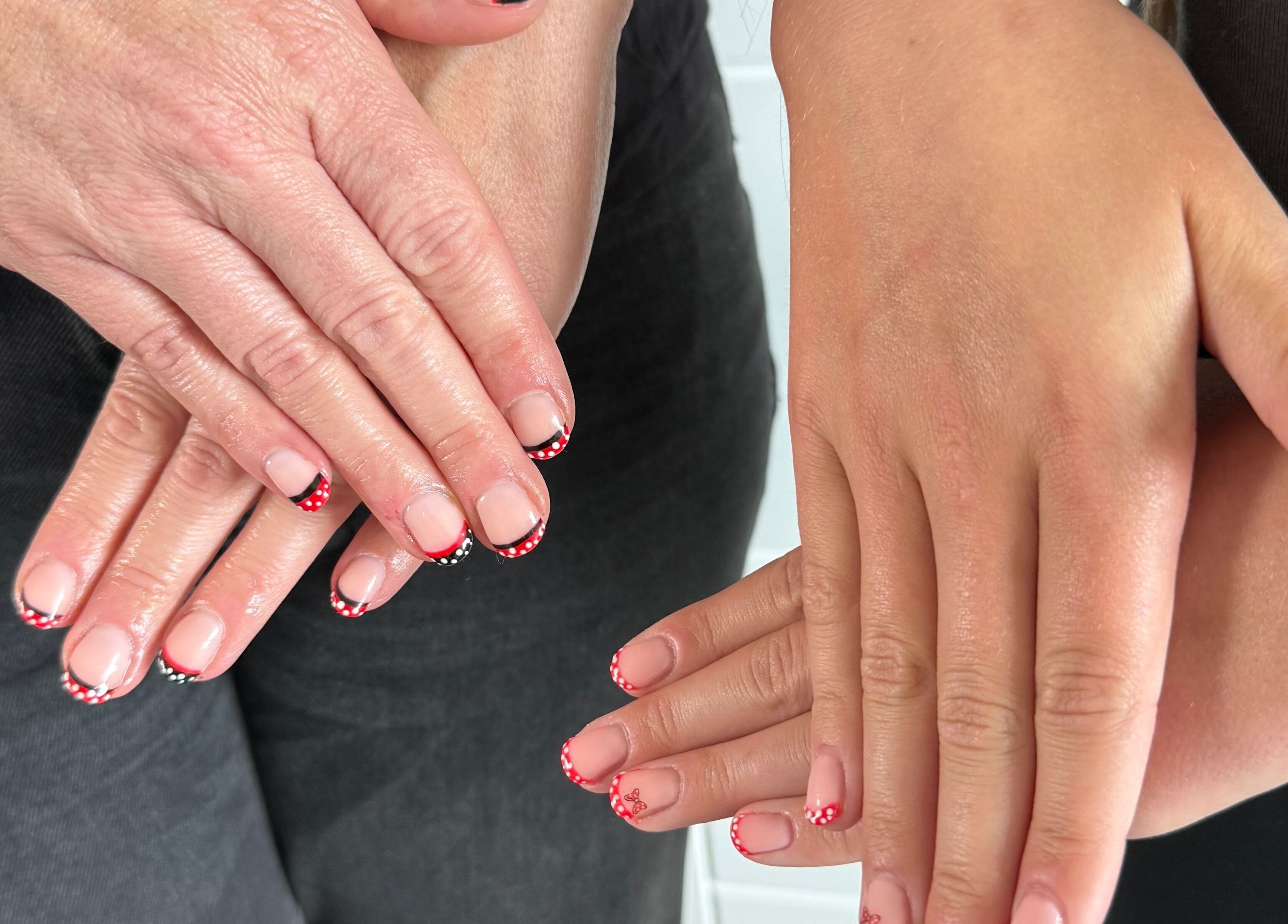 Freshly manicured hands with elegant nail art at Jewels Not Tools by Amy, Newton Mearns, Scotland, GB.