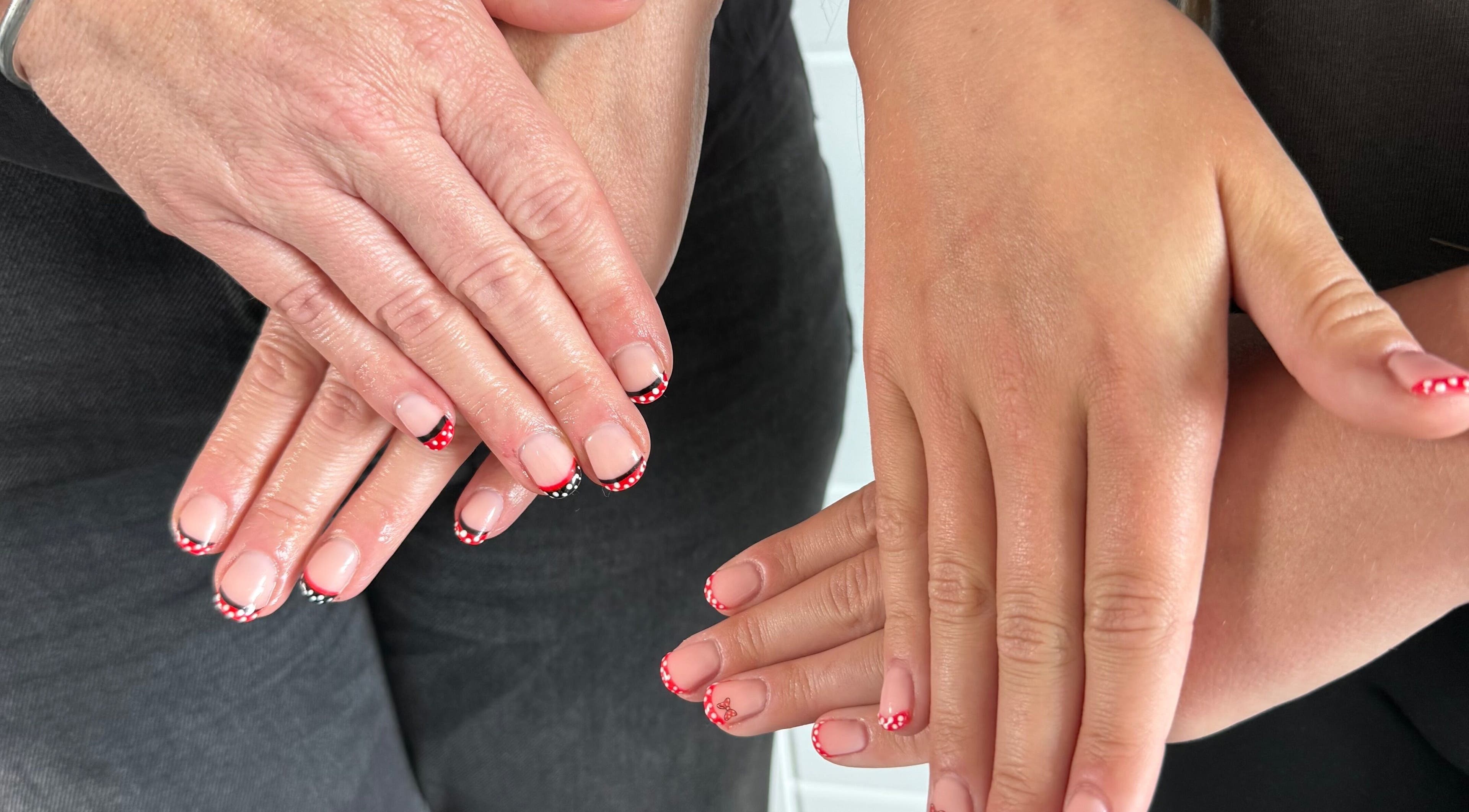 Freshly manicured hands with elegant nail art at Jewels Not Tools by Amy, Newton Mearns, Scotland, GB.