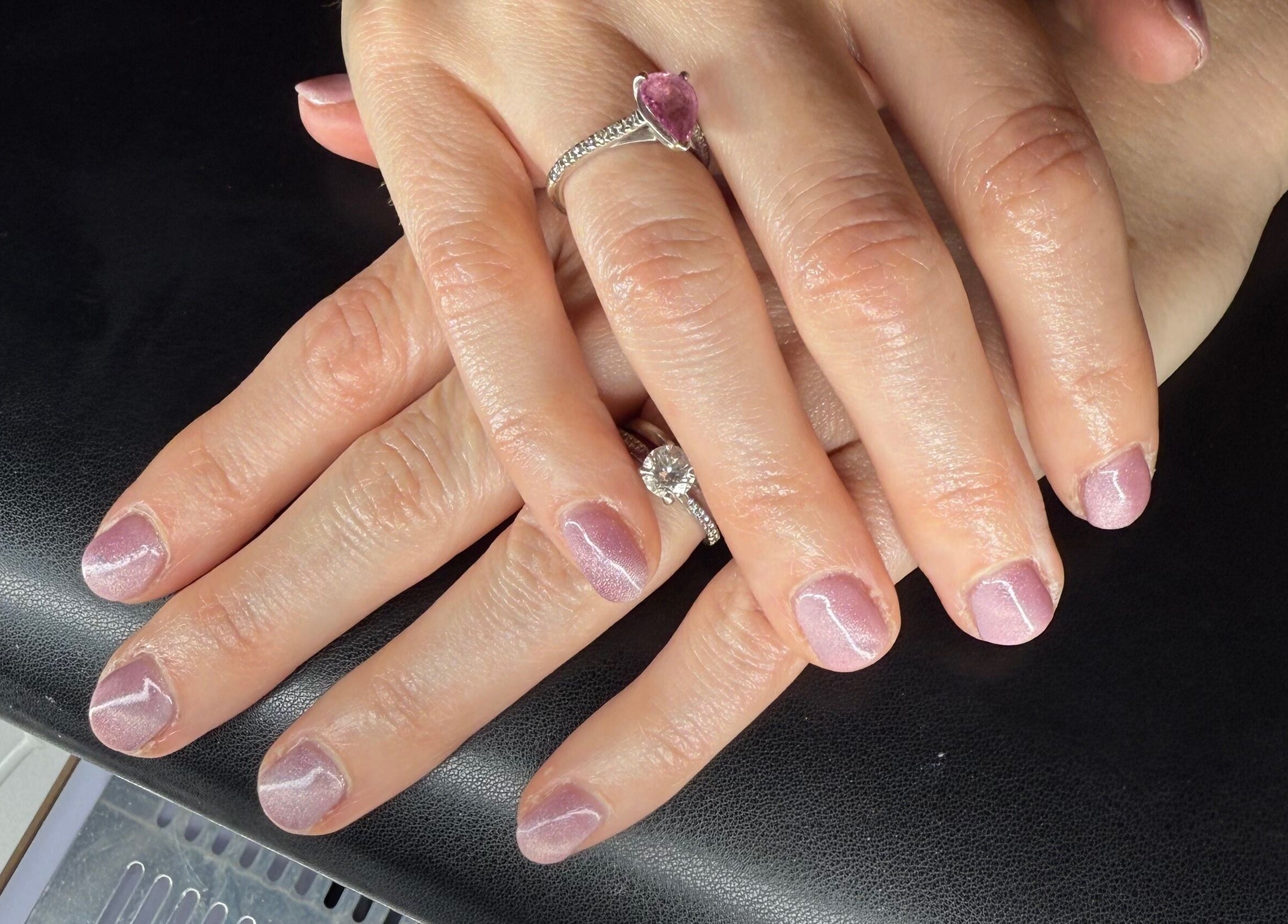 Delicate pink manicure with rings at Jewels Not Tools by Amy, Newton Mearns, Scotland, GB.