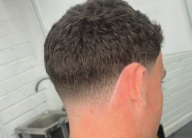 Close-up of a stylish fade haircut at Aspect Male Grooming, Dublin, County Dublin, IE.