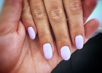 Manicured lavender nails at Freedombeauty in Plymouth, England, GB showcasing elegant nail art.