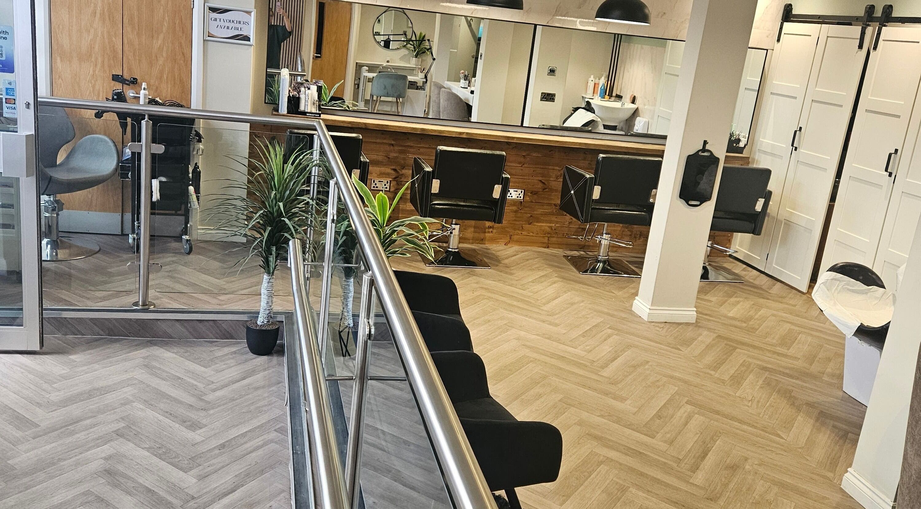 Modern salon interior at Bonita Tillicoultry, Tillicoultry, Scotland, GB showcasing stylish decor and seating.