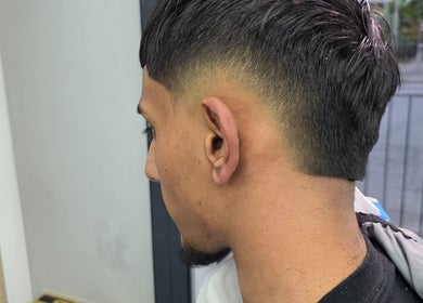 Fresh fade haircut at Noor Blends, London, England, GB.