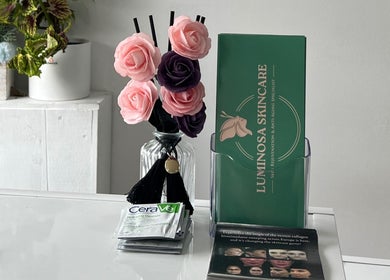Elegant skincare brochures and rose decor at Andreea Arcalianu, Dagenham, England, GB.