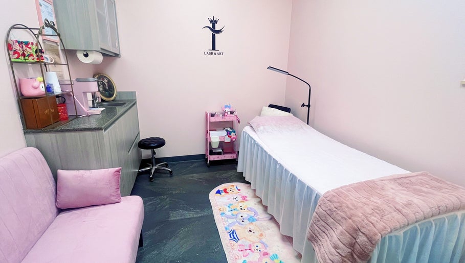 Tranquil treatment room at I Lash & Art, Monrovia, California, US with soft lighting and comfortable bedding.