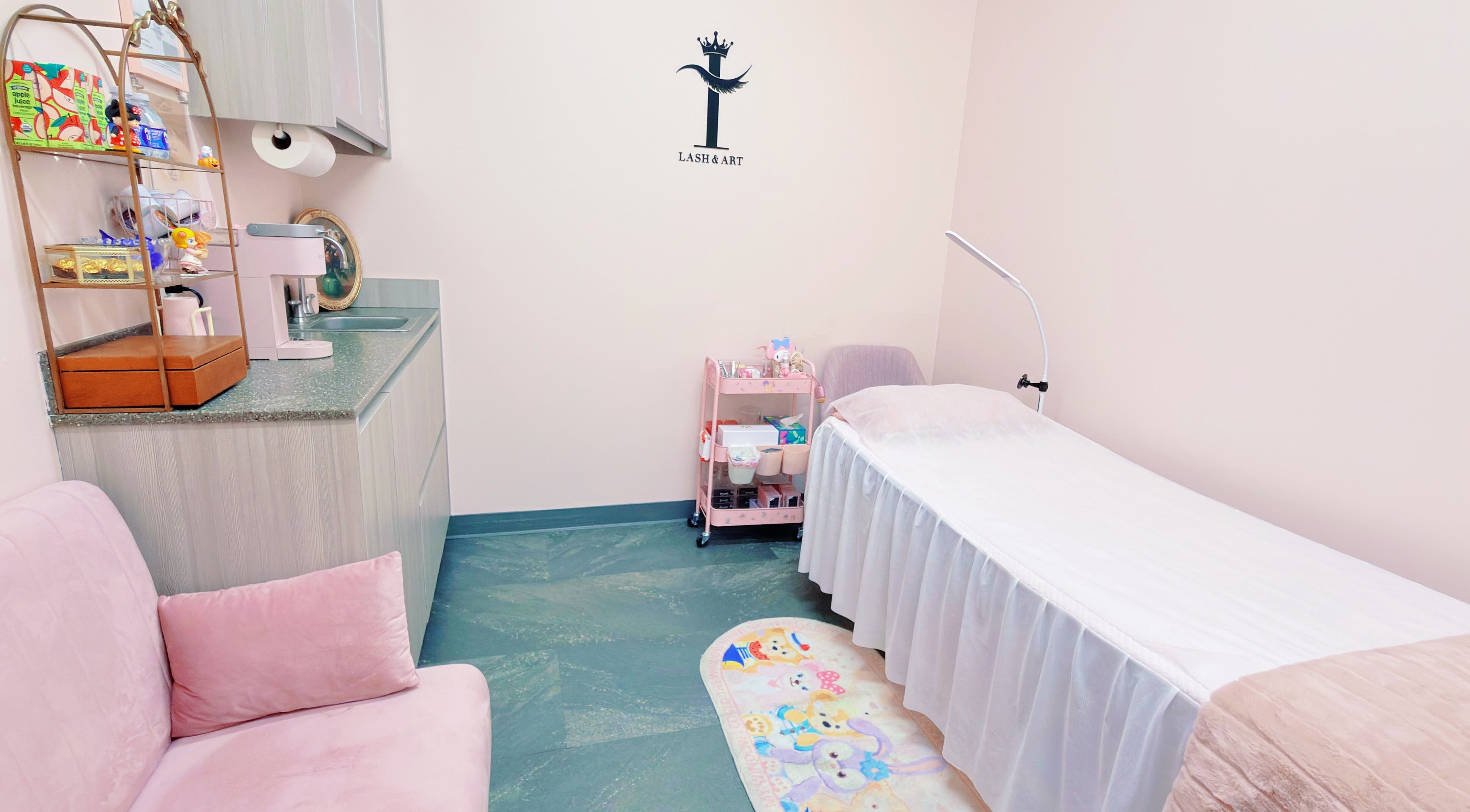 Cozy and serene beauty treatment room at I Lash & Art, Monrovia, California, US, featuring soft pink decor.