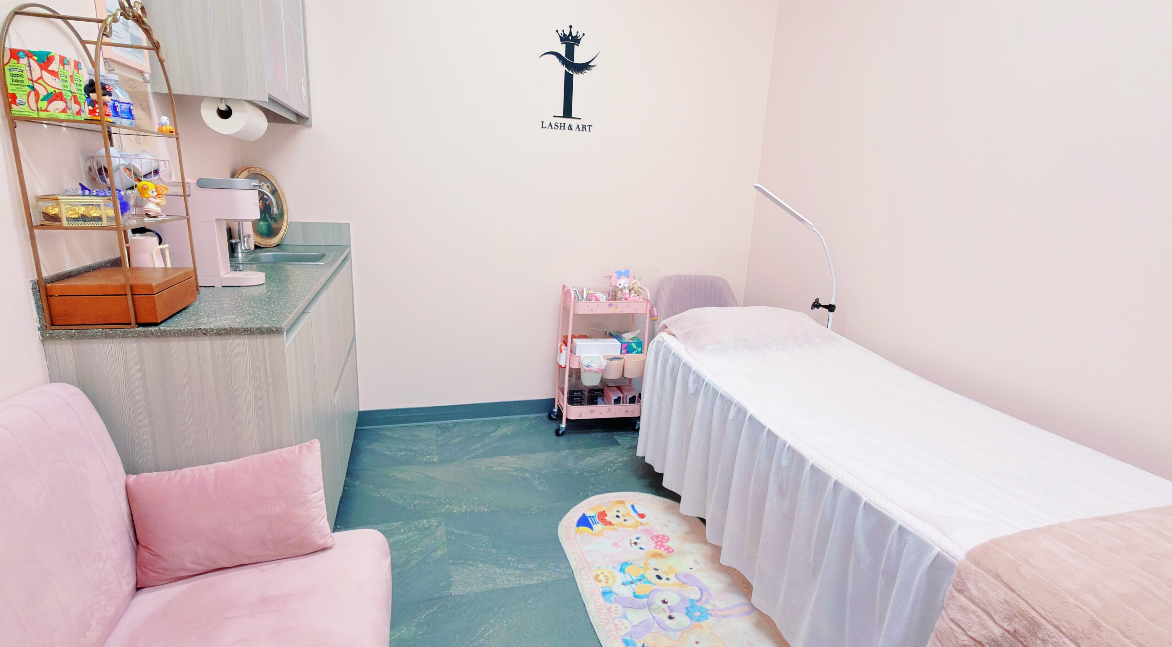 Cozy and serene beauty treatment room at I Lash & Art, Monrovia, California, US, featuring soft pink decor.