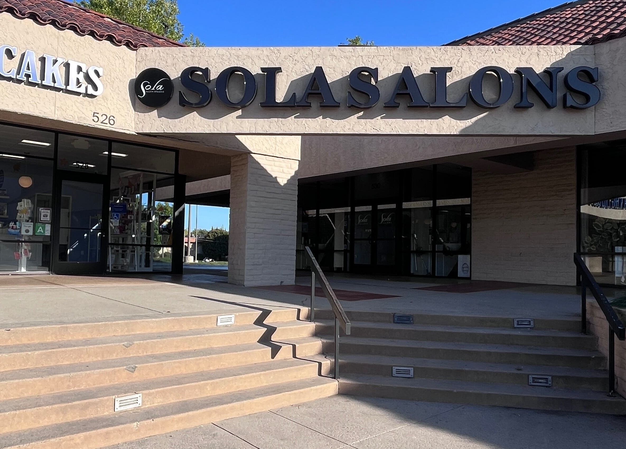 Entrance of Sola Salons at I Lash & Art in Monrovia, California, US with modern architecture.