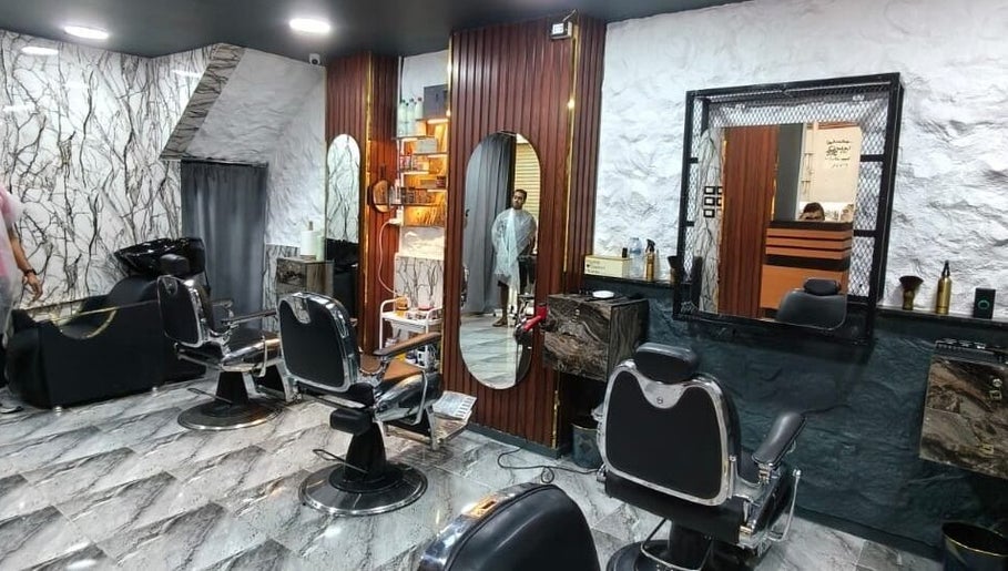 Elegant beauty salon interior at Boss Cut, Cairo Governorate, EG, with modern styling chairs and mirrors.