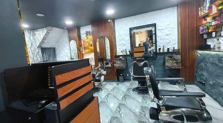 Modern interior of Boss Cut salon in Cairo Governorate, Cairo Governorate, EG, featuring stylish seating and decor.