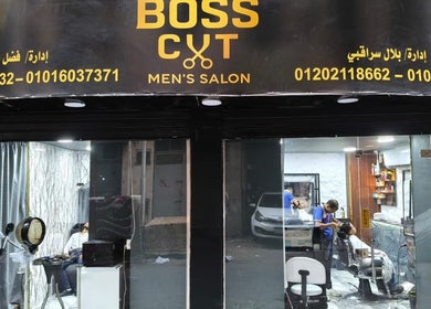 Exterior view of Boss Cut men's salon, Cairo Governorate, EG, showcasing the entrance and stylish signage.