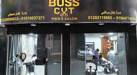 Exterior view of Boss Cut men's salon, Cairo Governorate, EG, showcasing the entrance and stylish signage.