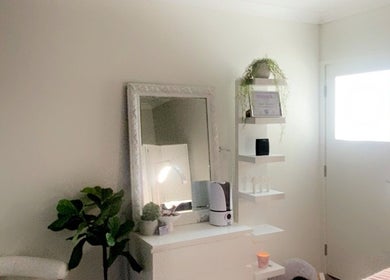 Luxelashesbytaliah's calming treatment room in Coomera, Queensland, AU featuring chic decor and relaxing ambiance.