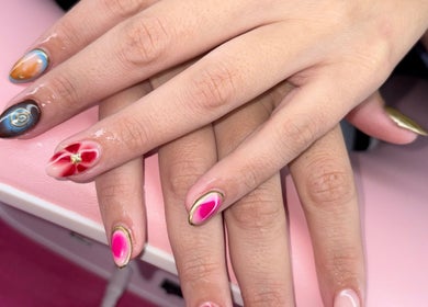 Colorful artistic nail art at Nails by Paige in Payson, Arizona, US. Vibrant, creative nail designs with elegance.