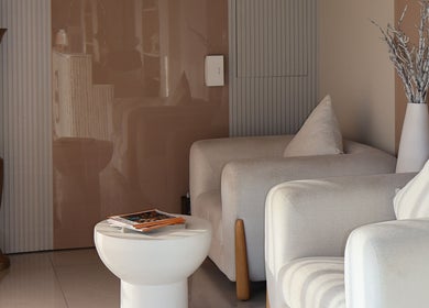 Elegant waiting area at Nails Eleven Salon, Dubai, AE with plush seating and decor.