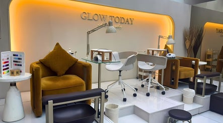 Sophisticated interior of Nails Eleven Salon in Dubai, AE, showcasing plush seats and vibrant nail polish options.