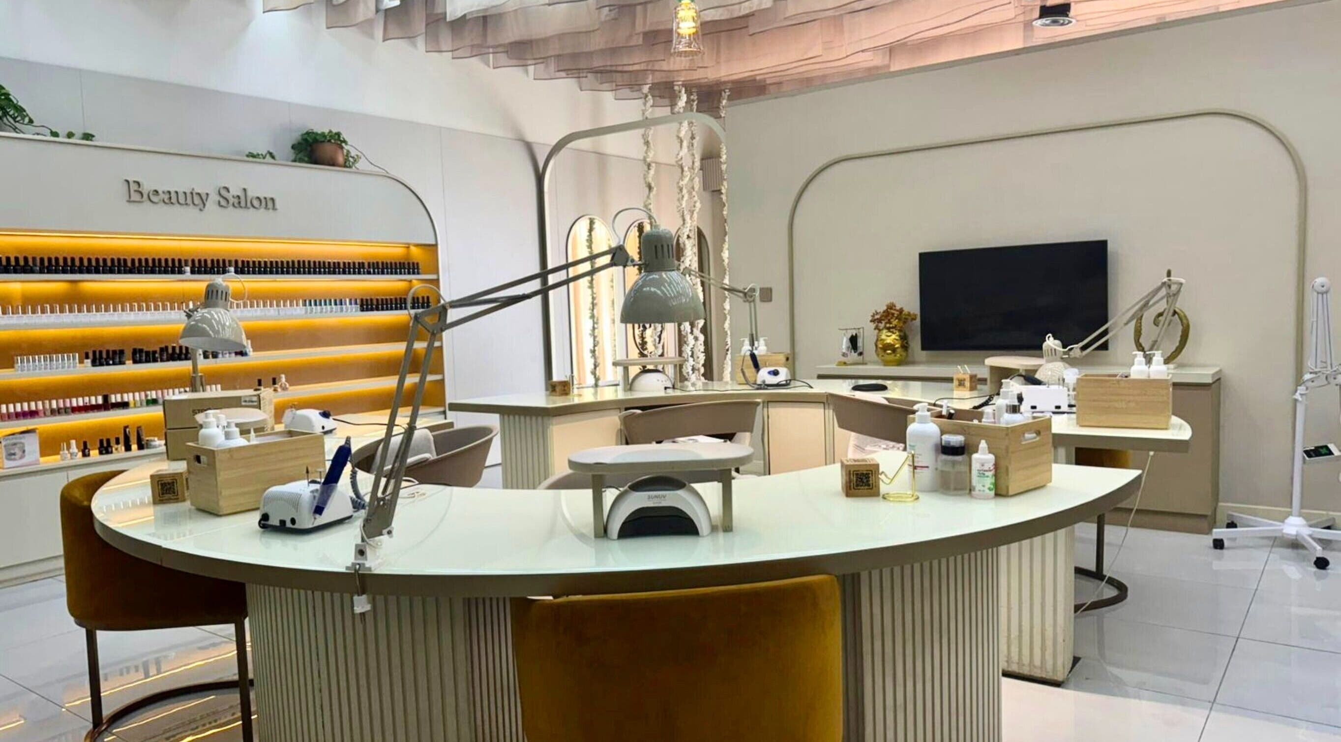 Luxurious interior of Nails Eleven Salon featuring nail care stations in Dubai, AE.