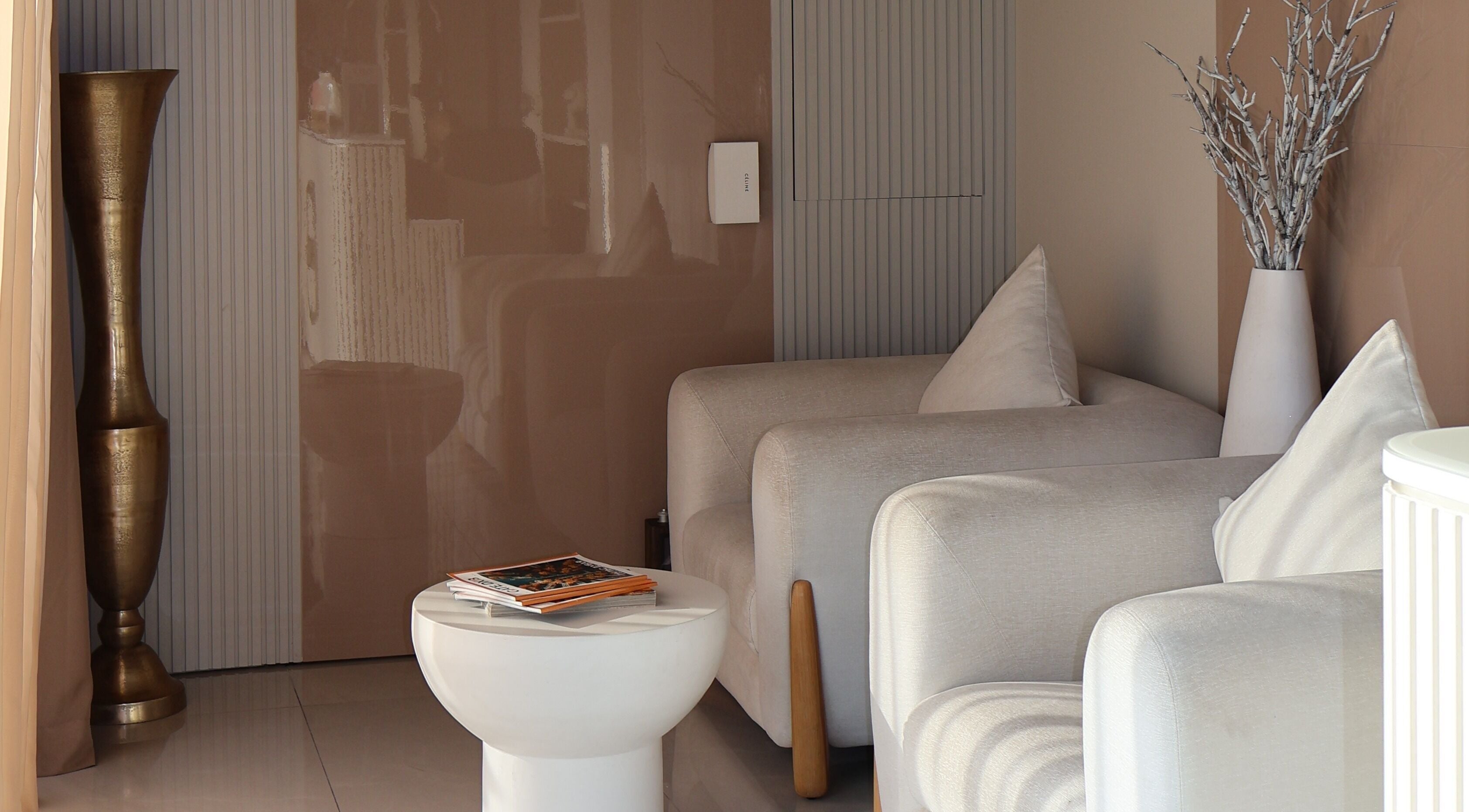 Cozy lounge area with plush seating at Nails Eleven Salon, Dubai, AE.