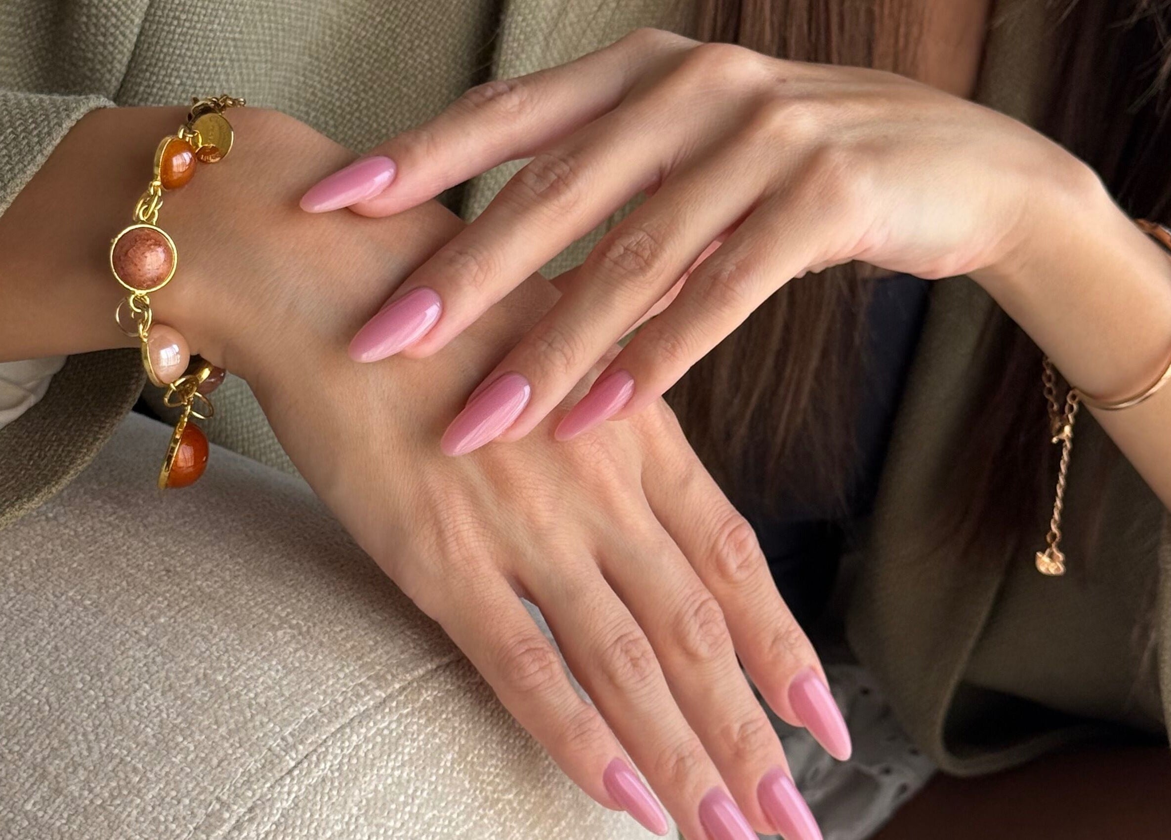 Elegant pink manicured nails at Nails Eleven Salon, Dubai, AE.