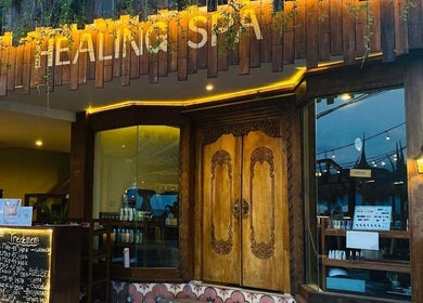 Entry of La Bella Healing Spa adorned with warm lights, located in Nusa Tenggara Barat, ID.