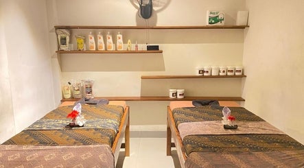 Peaceful treatment room at La Bella Healing Spa, Nusa Tenggara Barat, ID, offering relaxing spa services.