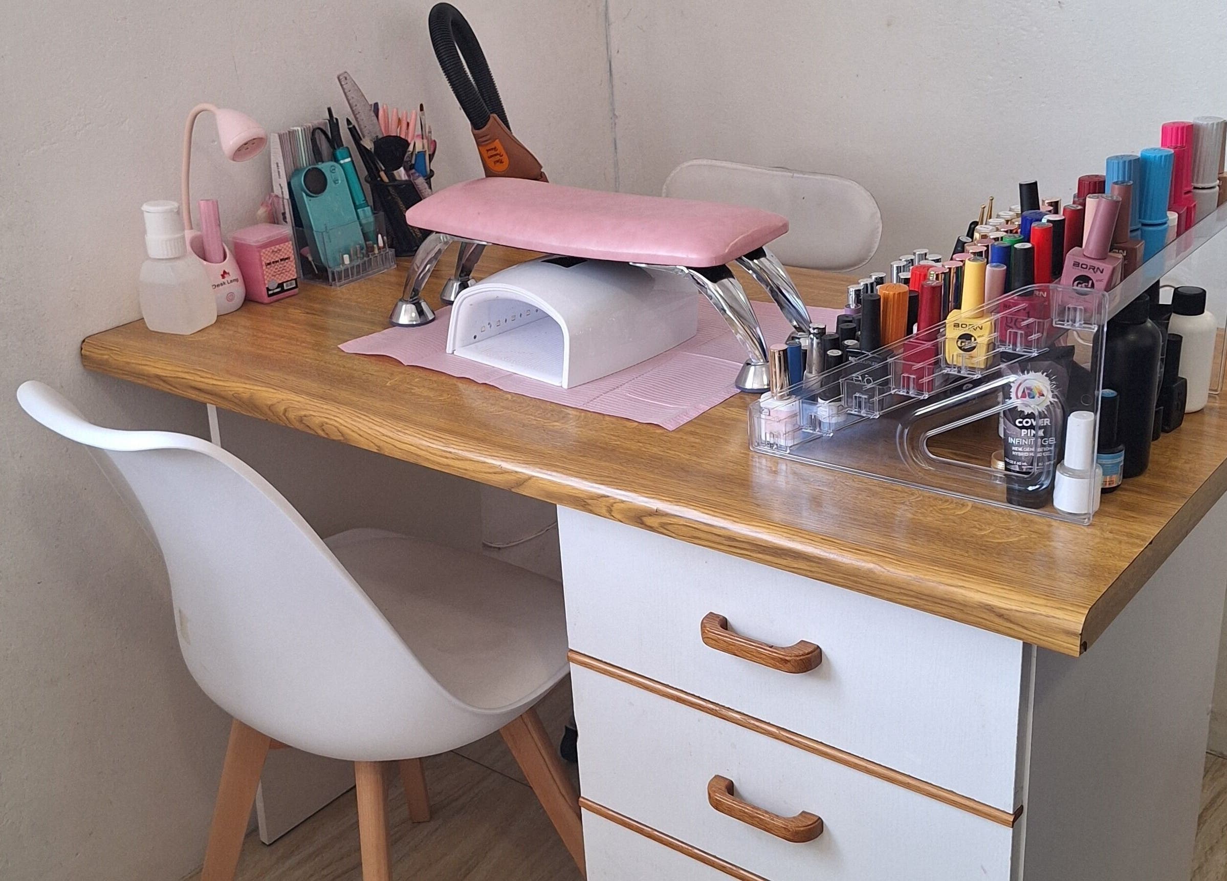 Nail care station at Nene's Beauty Mobile Spa, Cape Town, Western Cape, ZA, with vibrant polish selection.