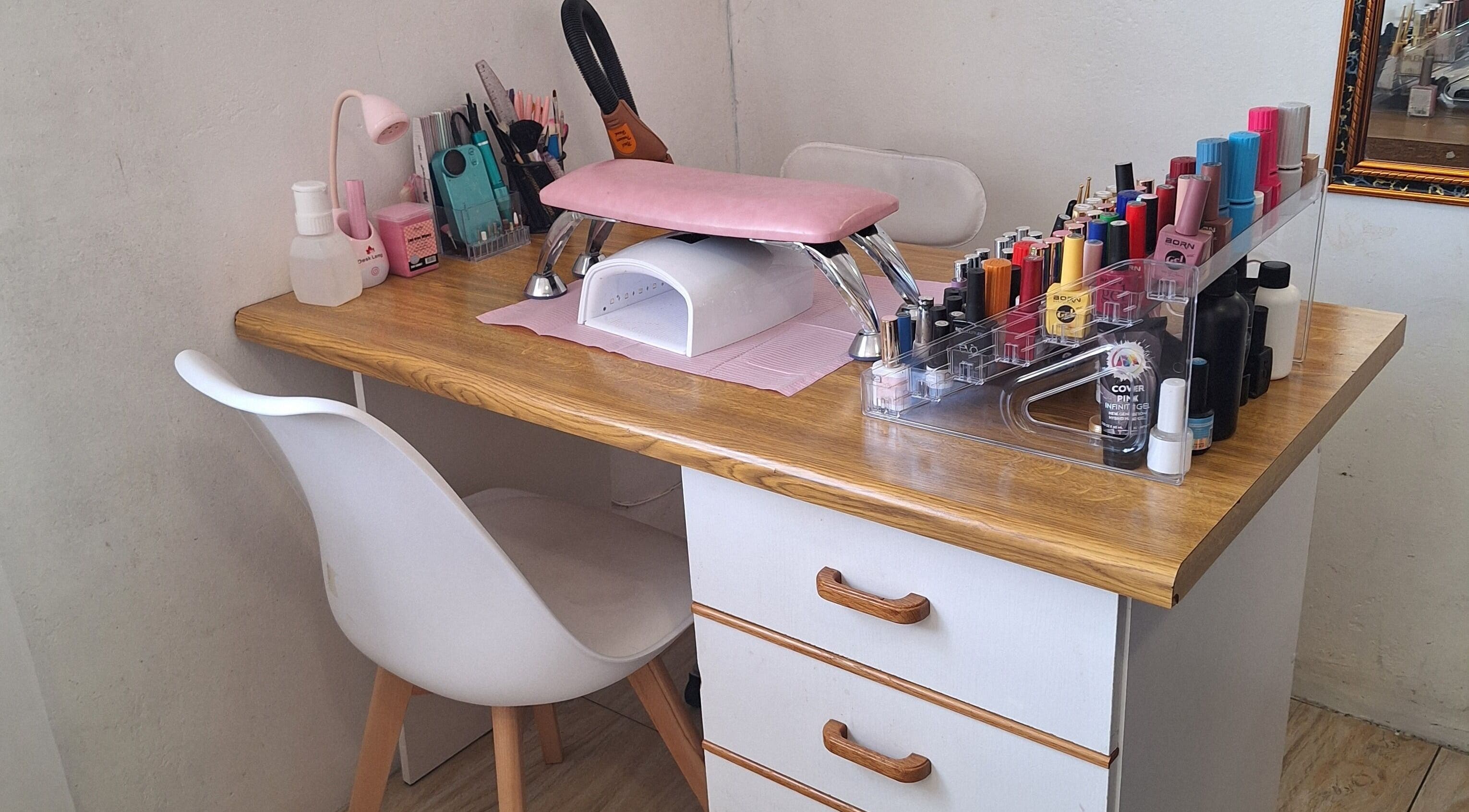 Nail care station at Nene's Beauty Mobile Spa, Cape Town, Western Cape, ZA, with vibrant polish selection.