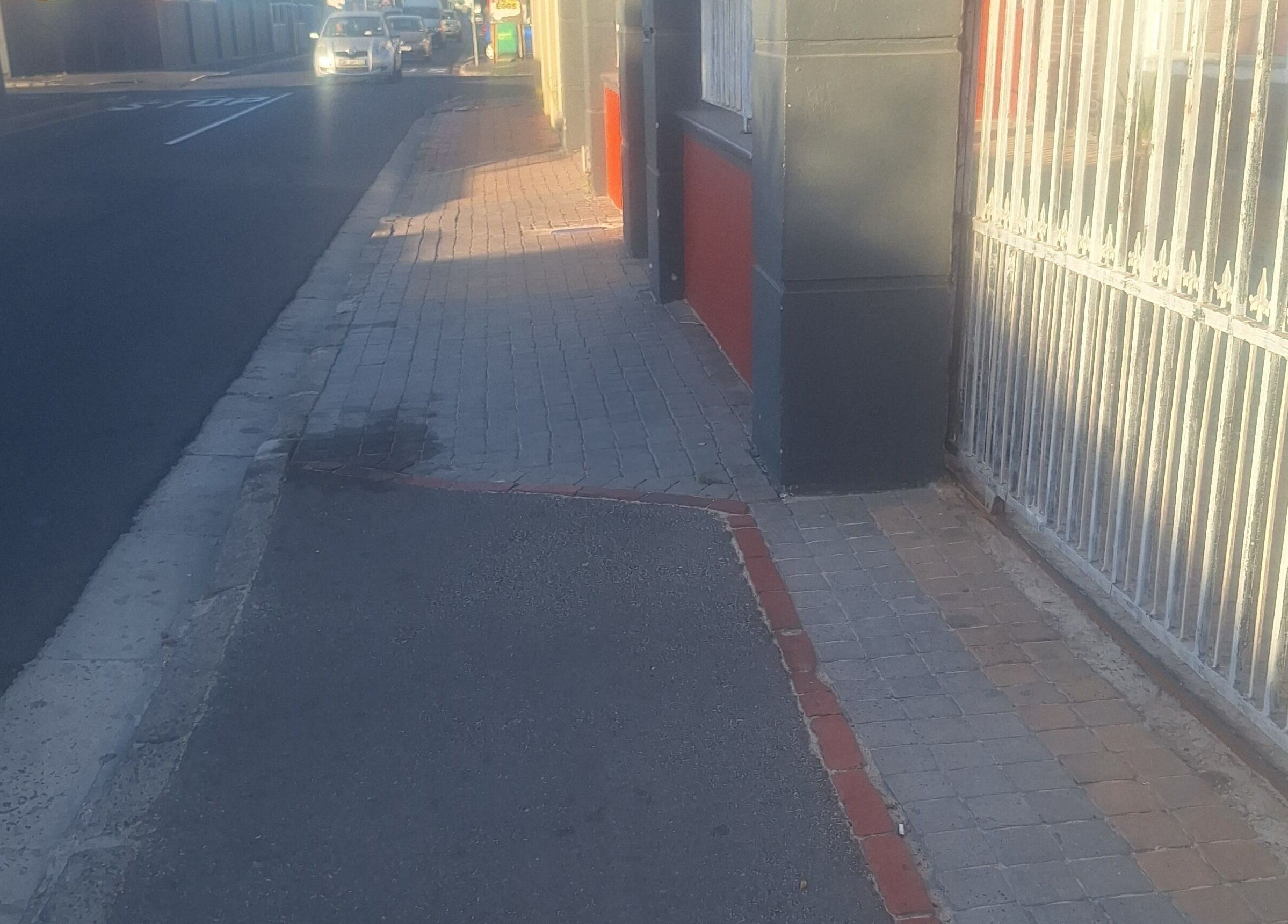 Sidewalk view near Nene's Beauty Mobile Spa, Cape Town, Western Cape, ZA with urban street elements.