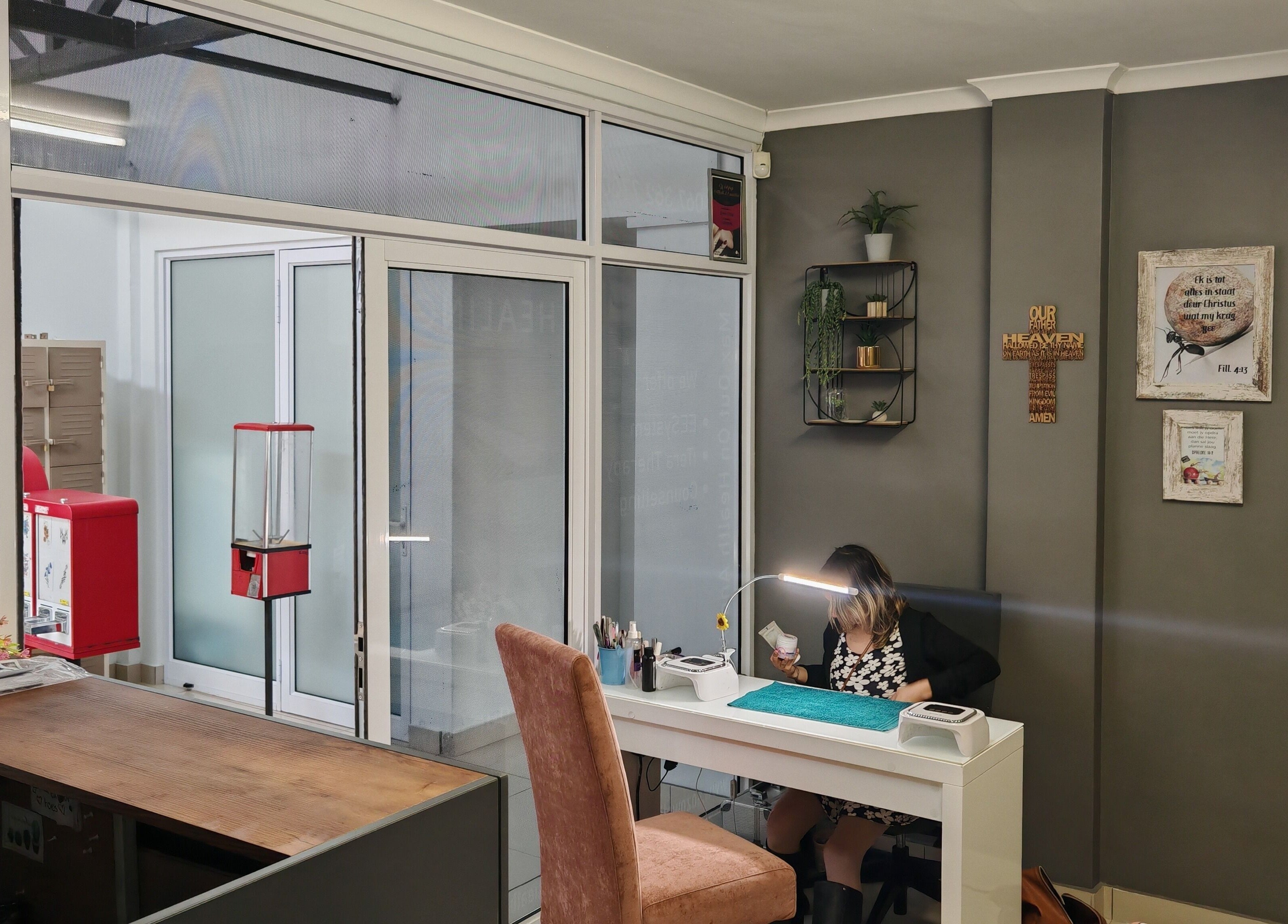 A cozy beauty station at Sozo Wellness in Mossel Bay, Western Cape, ZA, featuring modern decor and a welcoming atmosphere.