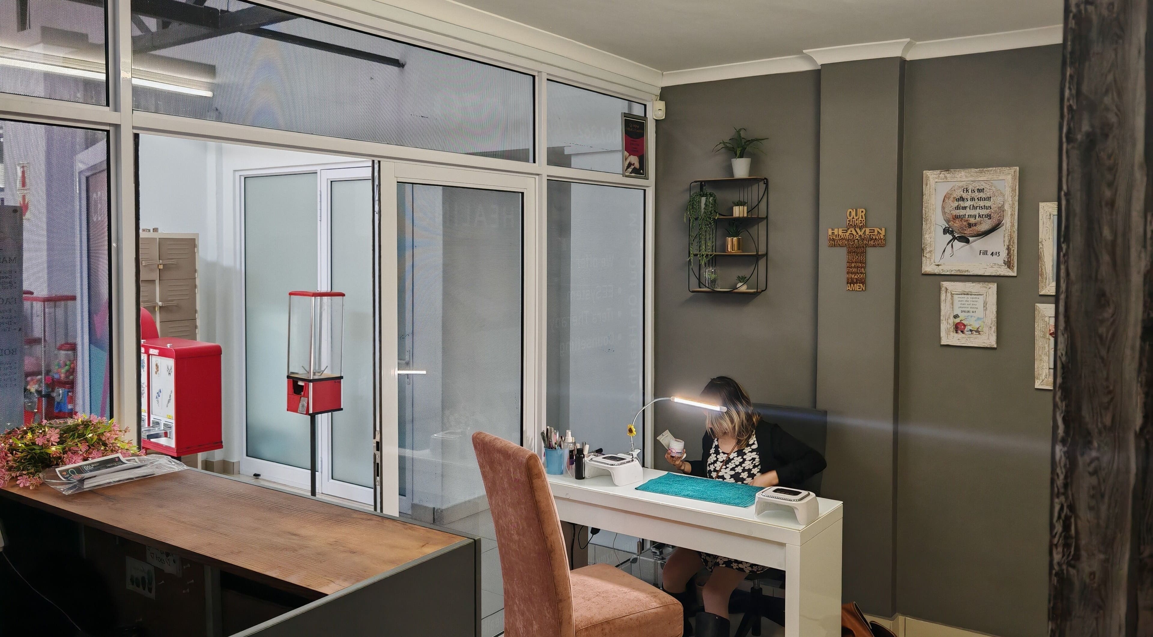 A cozy beauty station at Sozo Wellness in Mossel Bay, Western Cape, ZA, featuring modern decor and a welcoming atmosphere.