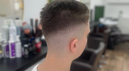Close-up of a modern fade haircut at JFM hair, Aberdeen, Scotland, GB. Perfect style for a fresh look.