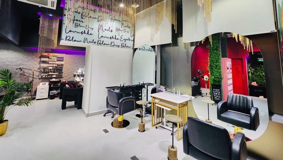 Luxurious interior of Lovushka Beauty Salon in Doha, Doha Municipality, QA featuring chic black seating and decor.